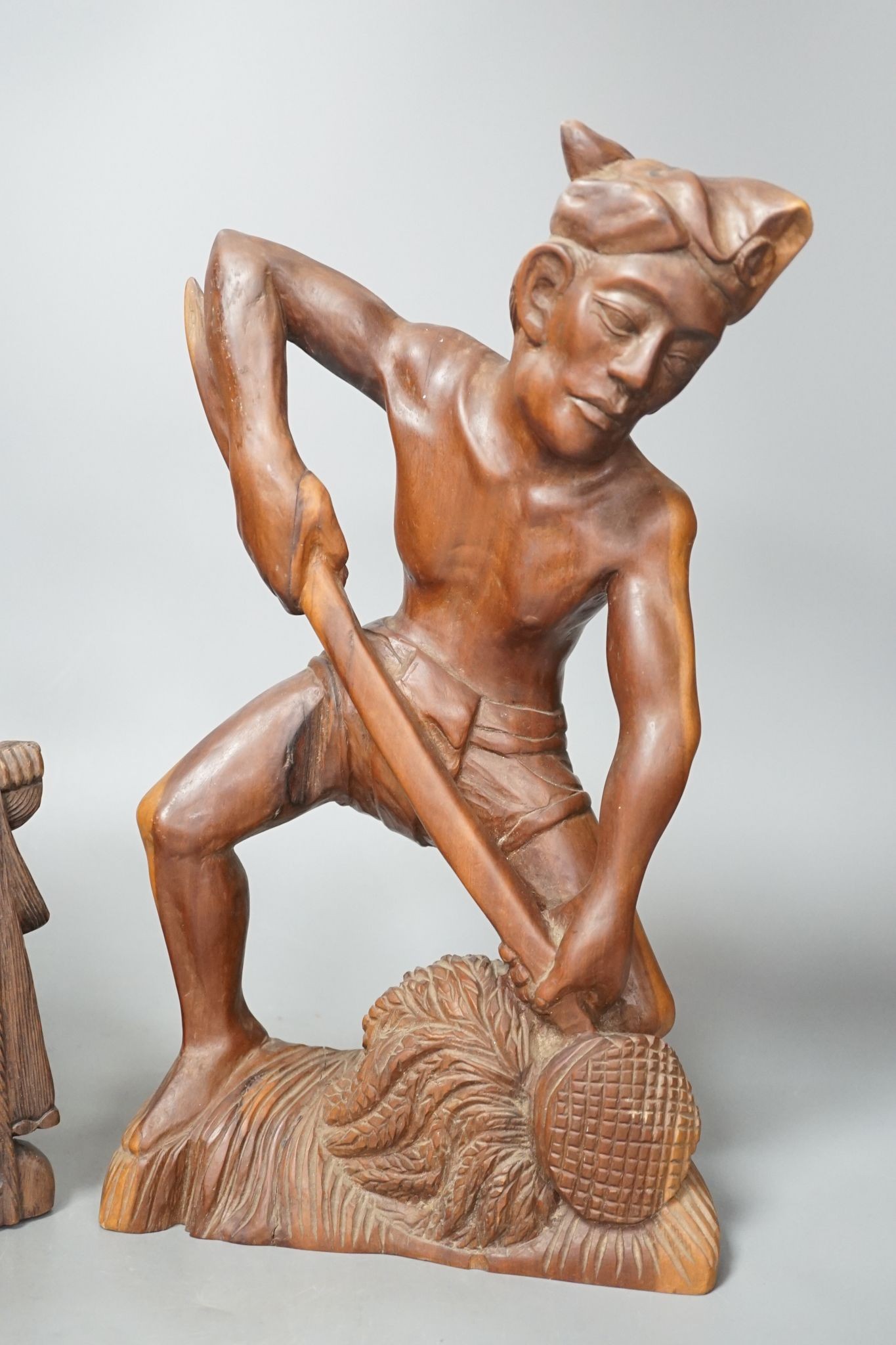 Two southeast Asian figural hardwood carvings 35cm